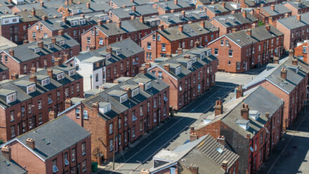 birds eye view of rows of red brick houses