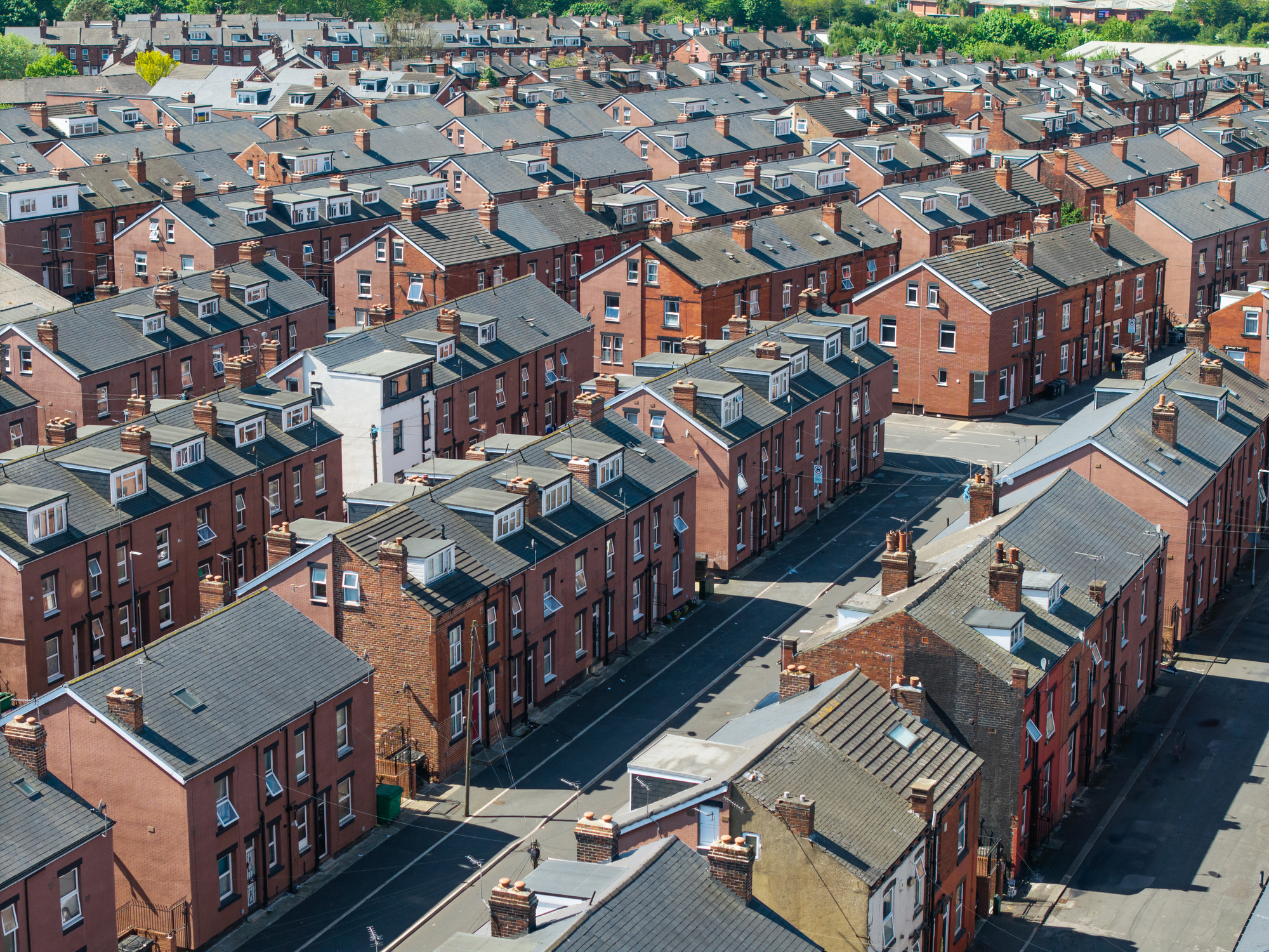 birds eye view of rows of red brick houses