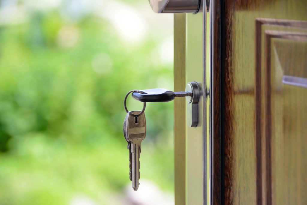 Keys handing from a front door lock