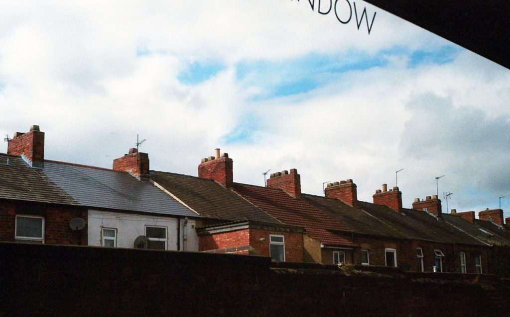 brown-roofed-buildings