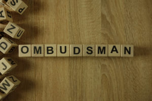 Ombudsman spelt out in wooden blocks